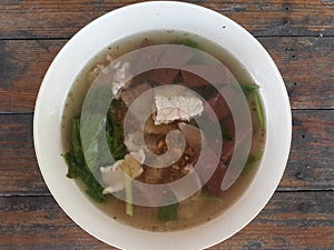 Boiled pig's blood with entrails in soup photo