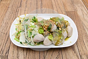 Boiled pork ball with spicy dipping sauce and vegetable