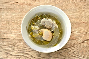 boiled pork leg and belly with cowa leaf soup on bowl