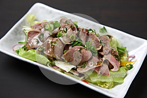 Boiled pork tongue with vegetable