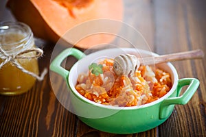 Boiled pumpkin with rice and honey