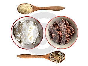 Boiled rice in bowl with raw cereal rice in wooden spoon between jasmine and riceberry rice top view isolated on white background.