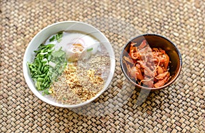 Boiled rice with eggs, a traditional breakfast of the Akha hill tribes at Ban Pha Hee, Chiang Rai Province