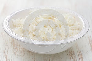 Boiled rice on white bowl