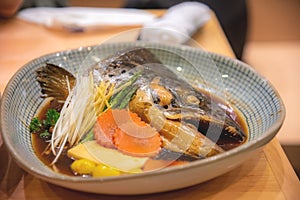 Boiled salmon head in japanese style sauce