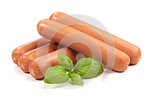 Boiled sausages with basil, isolated on white background