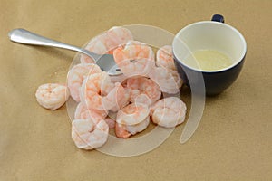 Boiled shrimp and melted butter photo