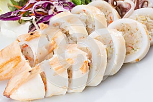 Boiled squid served in white dish