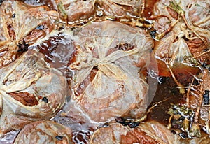 Boiled Stewed pork legs in thin fabric package, boiled with chinese herbs