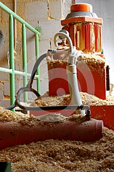Boiler room hydraulic system supplying sawdust