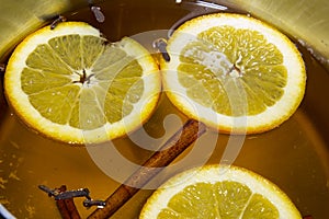 Boiling Apple Cider with Orange Slices