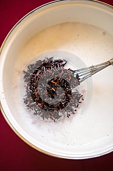 Boiling black rice