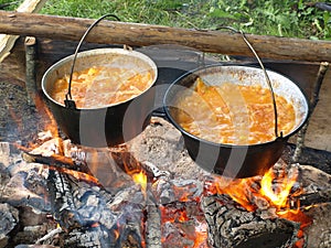 Boiling caldrons on wood fire