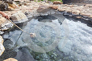 Boiling eggs in the hot spring,  Thailand
