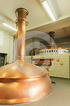 Boiling kettle and mash tun in the background.