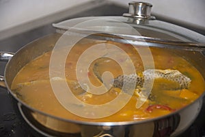 Boiling pot of Chraime, a traditional sephardic north African soup