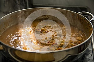 Boiling pot of Chraime, a traditional sephardic north African soup