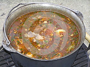 Boiling soup in the cauldron