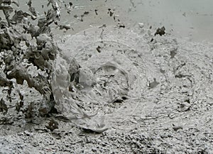 Boiling and splashing mud at Wai-O-Tapu Thermal Wonderland geothermal area, Rotorua, New Zealand