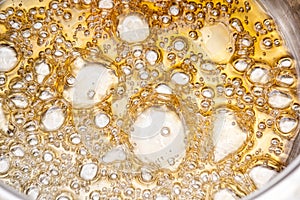 Boiling sugar with bubbles turns into caramel, caramelization