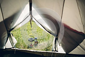 Boiling water in kettle on portable camping stove