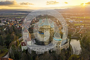 Bojnice castle and town in Slovakia from aerial view at sunrise.