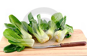 Bok choy leaf on chopping board