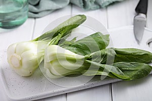 Bok choy, or pak choi on a cutting board