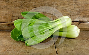 Bok choy vegetable on the wooden background