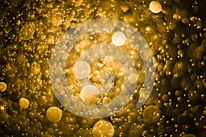 Bokeh abstract background with gold light color