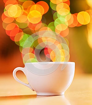 Bokeh, background and cup for coffee or tea, fine china or porcelain with crockery for drink, catering and kitchenware