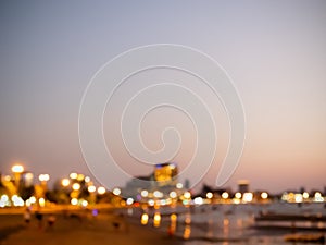 Bokeh of Blur Night Light City Background Abstract View Skyline Travel Ciryscape Illuminated, Golden Colorful Buiding Blurry Focus photo