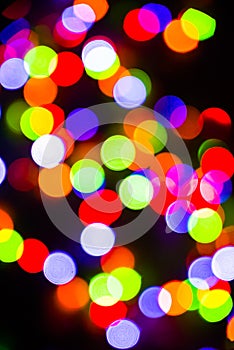 Bokeh of blurred Christmas lights - all colours - green, blue, orange, white, red