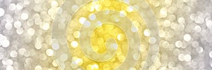 Bokeh circle with gold sparkles background. Yellow and grey glitter backdrop