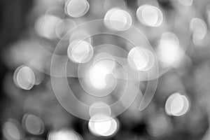Bokeh circles for Christmas background. Blur of bright light. Abstract decoration or design of blurred golden color