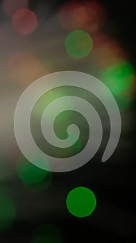 Bokeh circles light motion overlay green red rays