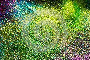 Bokeh effect glitter colorful blurred abstract background for birthday, anniversary, wedding, new year eve or Christmas