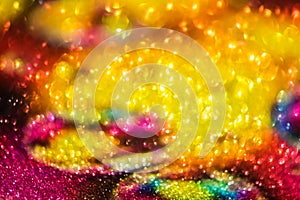 Bokeh effect glitter colorful blurred abstract background for birthday, anniversary, wedding, new year eve or Christmas