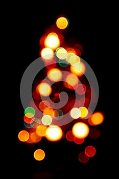Bokeh silhouette of Christmas tree