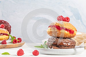 Bolas de Berlim, or Berlin Balls. Portuguese fried dough with sugar, Filled with chocolate or raspberry jam. Portuguese fried photo