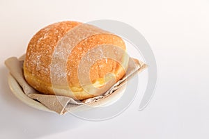 Bolas de Berlim, Berliner or donuts filled with egg jam, a very popular dessert in Portuguese pastry shops photo