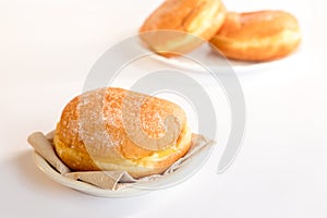 Bolas de Berlim, Berliner or donuts filled with egg jam, a very popular dessert in Portuguese pastry shops photo