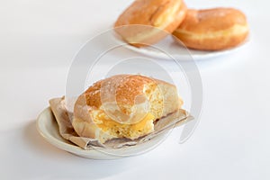 Bolas de Berlim, Berliner or donuts filled with egg jam, a very popular dessert in Portuguese pastry shops photo