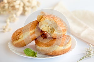 Bolas de Berlim, Berliner or donuts filled with egg jam, a very popular dessert in Portuguese pastry shops photo