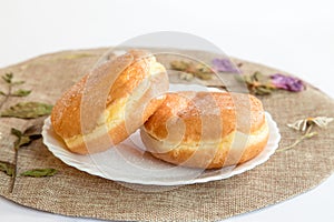 Bolas de Berlim, Berliner or donuts filled with egg jam, a very popular dessert in Portuguese pastry shops photo