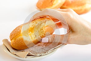 Bolas de Berlim, Berliner or donuts filled with egg jam, a very popular dessert in Portuguese pastry shops. photo