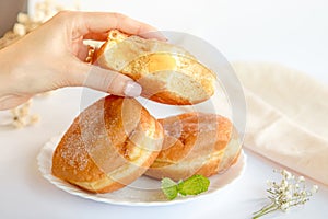 Bolas de Berlim, Berliner or donuts filled with egg jam, a very popular dessert in Portuguese pastry shops. photo