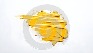 bold yellow stroke of paint with brush marks on a white background