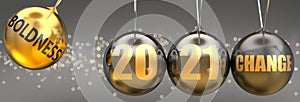 Boldness as a driving force of change in the new year 2021 - pictured as a swinging sphere with phrase Boldness giving momentum to
