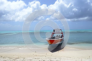 Boat in the shoreline of Cayo Bolivar, in Colombia